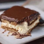 Delicious Chocolate Eclair Cake, an easy make-ahead dessert for any occasion.