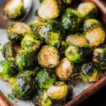 Plate of perfectly roasted Brussels sprouts seasoned for flavor