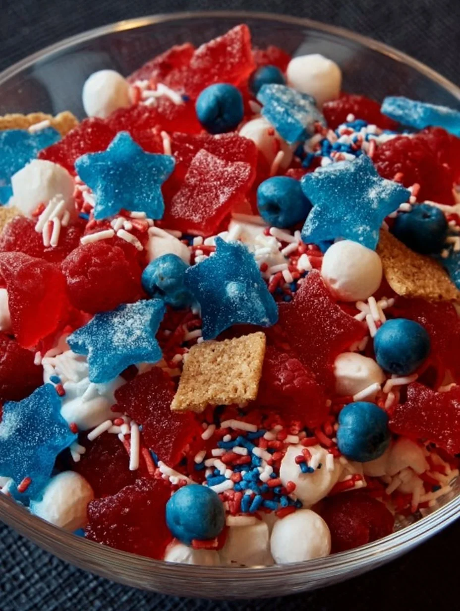 A colorful Stars and Stripes Candy Salad featuring red, white, and blue candies.