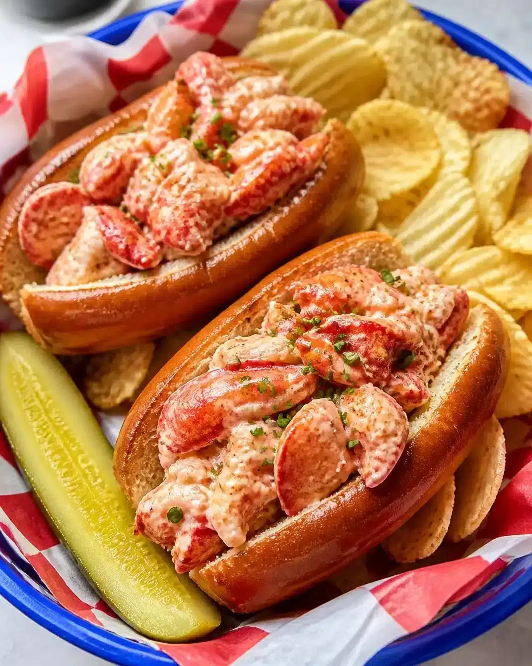 Delicious Maine lobster roll with fresh lobster meat and creamy sauce
